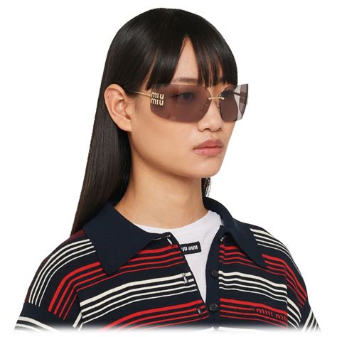 Miu Miu Sunglasses.